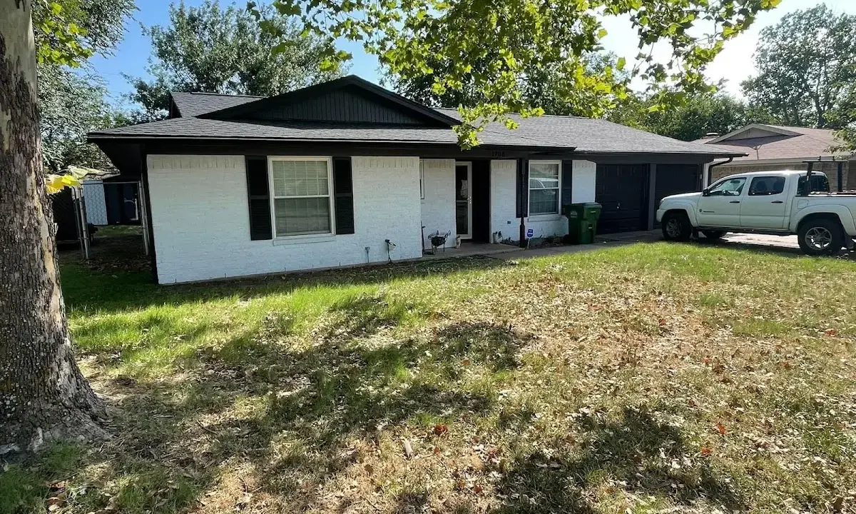 Professional roofing crew working on a residential roof in Carolina Shores